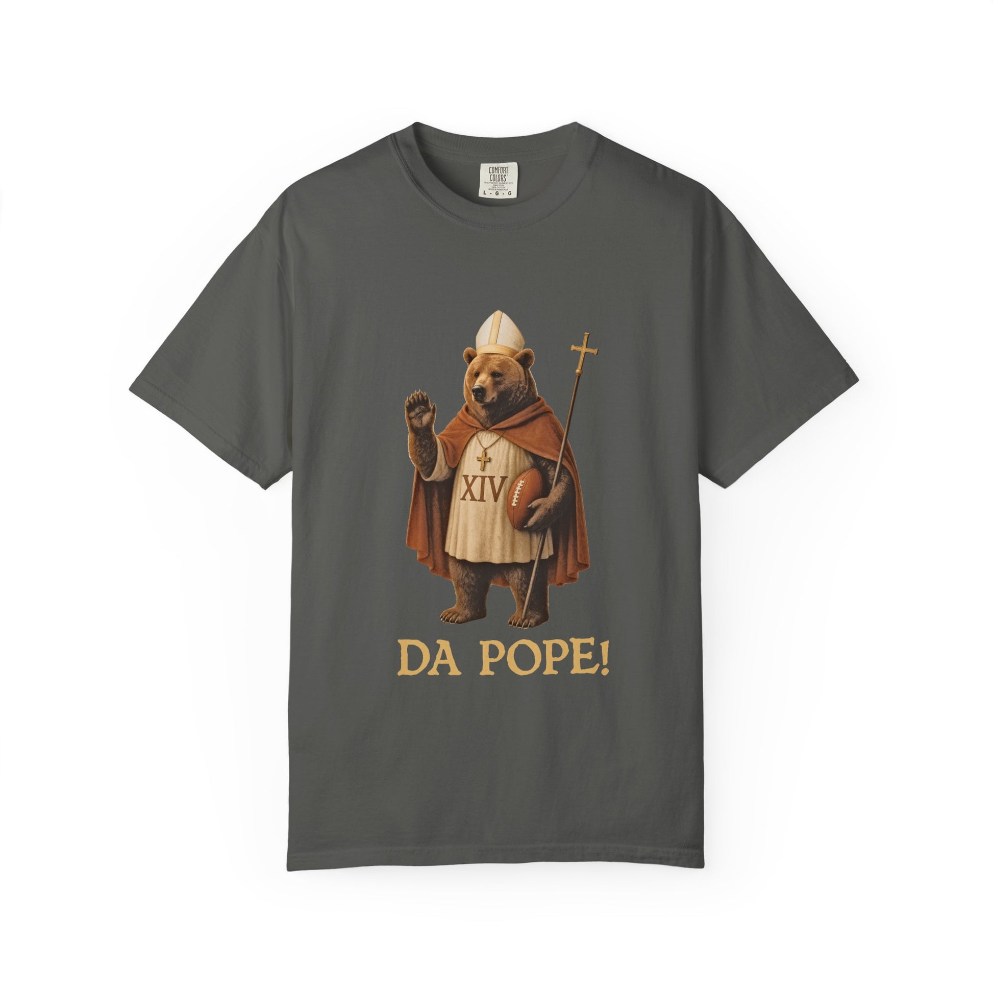 The front side of a pepper colored t shirt with a design of a Bear dressed as the pope with the saying DA POPE! below.