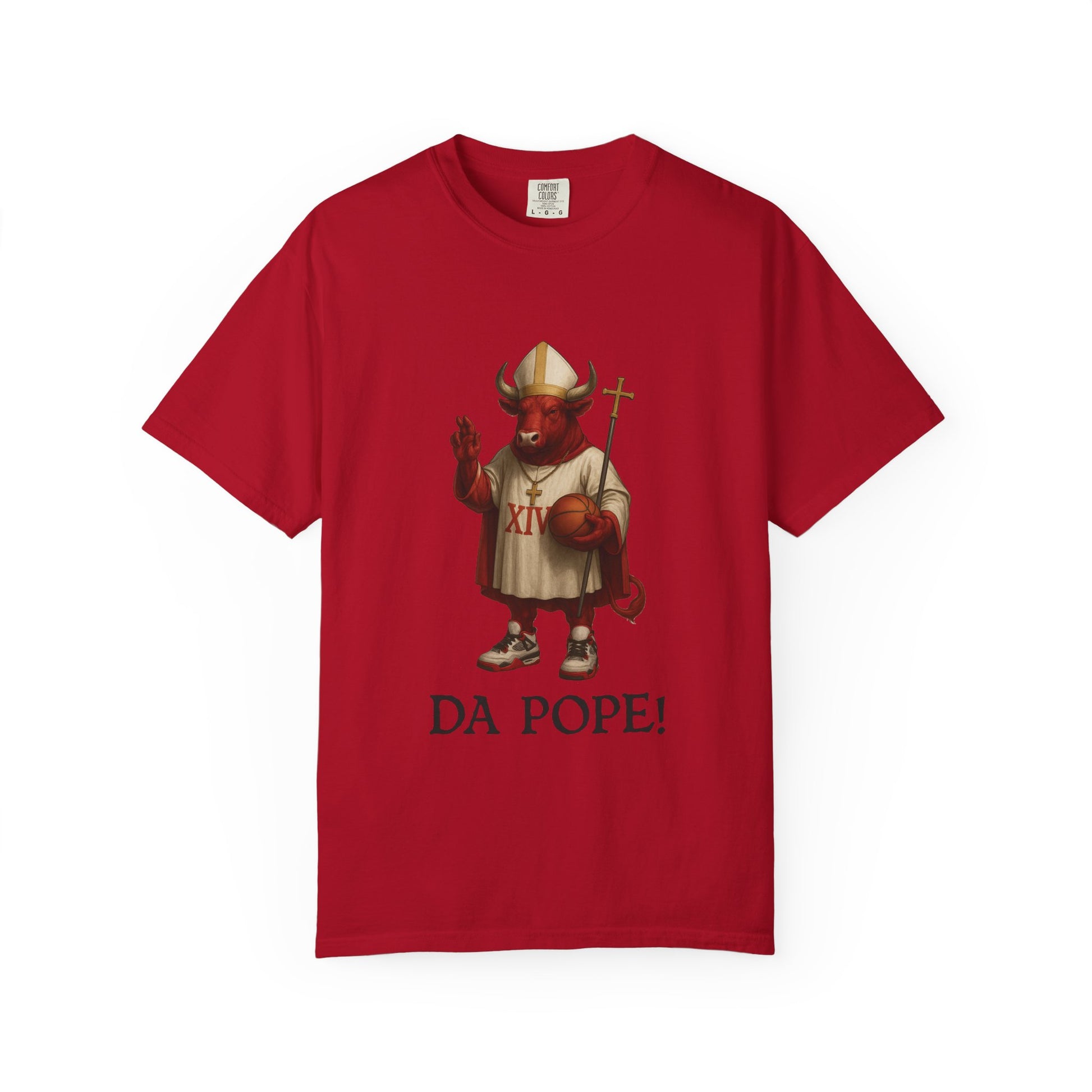 The front side of a black colored t shirt with a design of a red Bull dressed as the pope with the saying DA POPE! below.